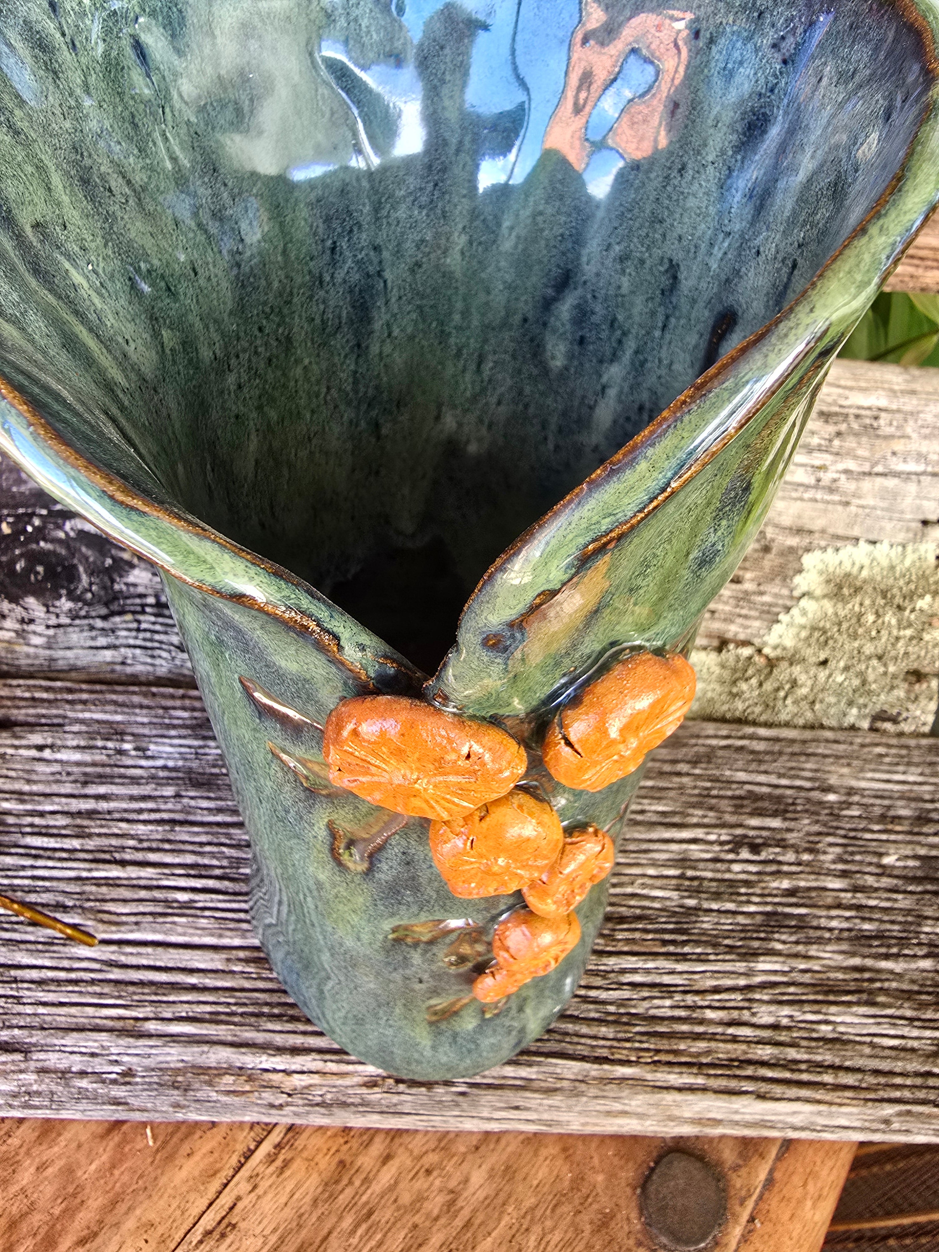 Iridescent green vase