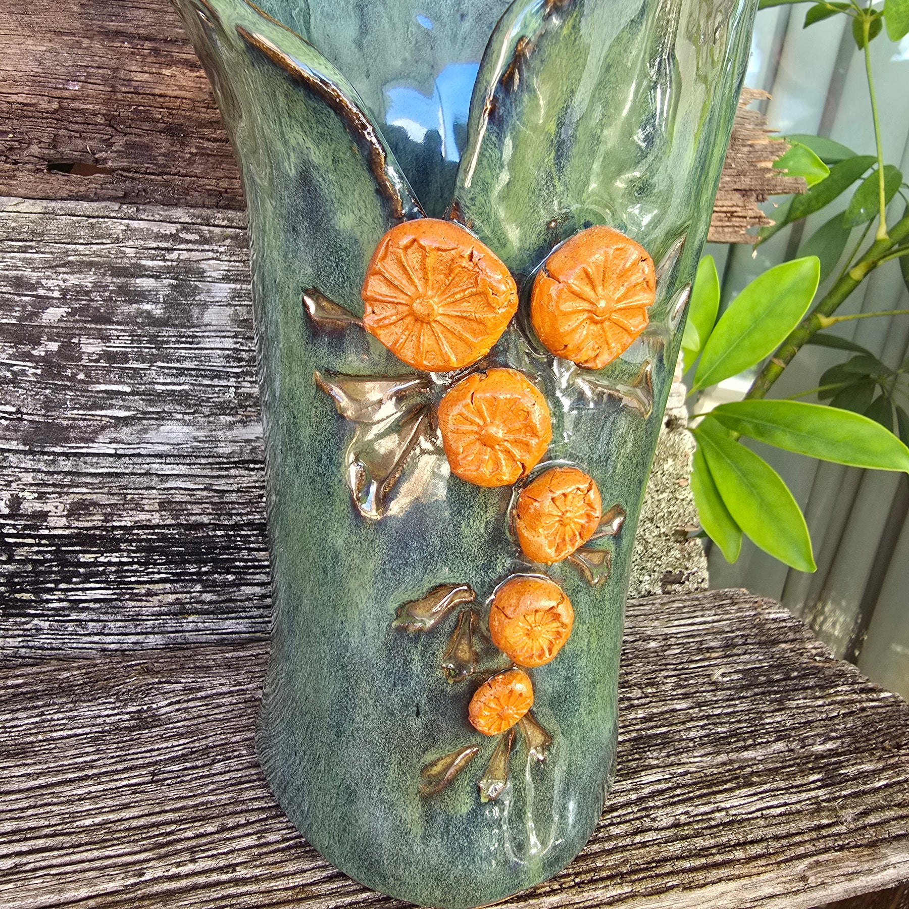 Iridescent green vase