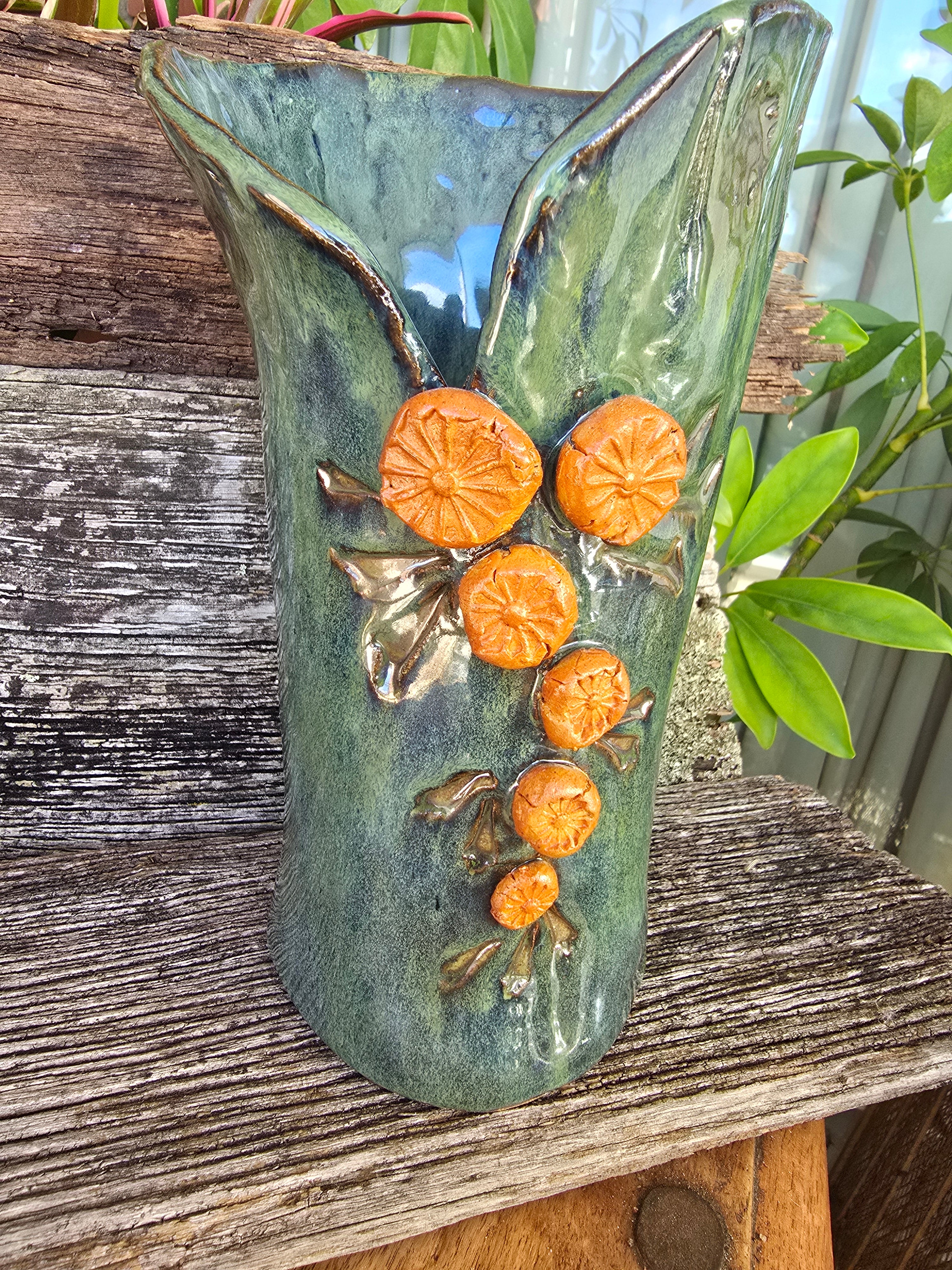 Iridescent green vase