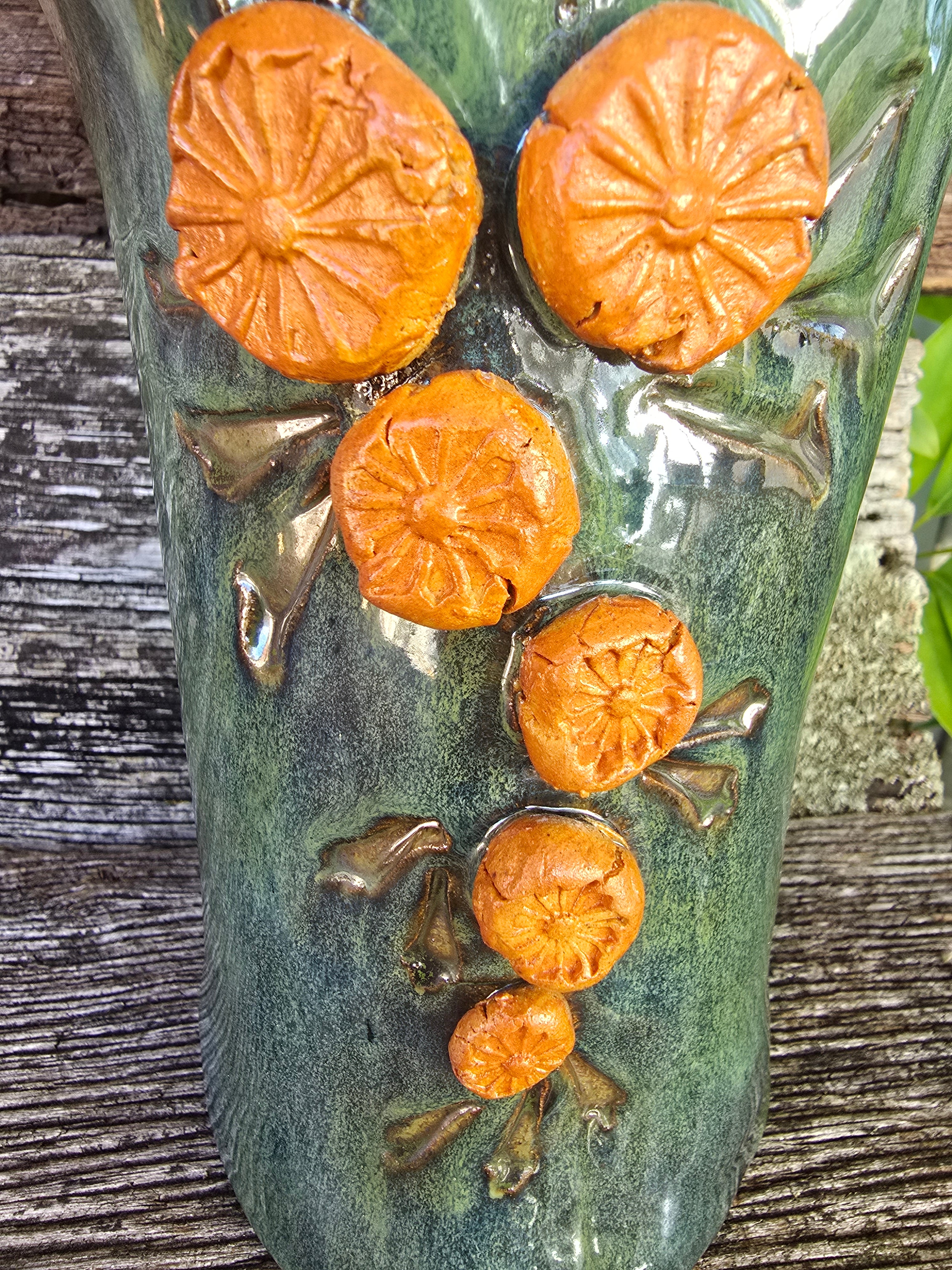 Iridescent green vase