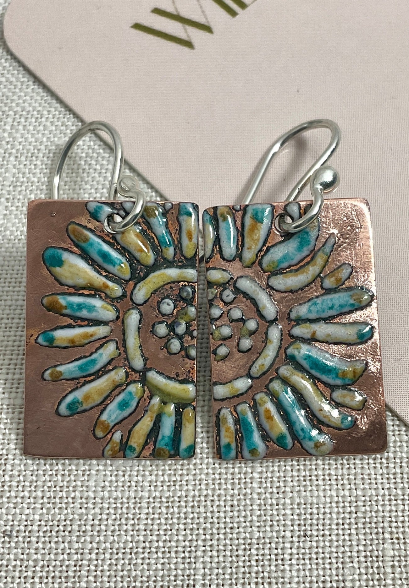 Embossed enamel. Handmade earrings.