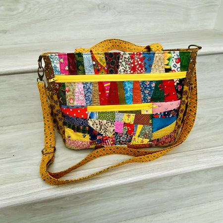 Cross body patchwork bag with elasticised side pockets