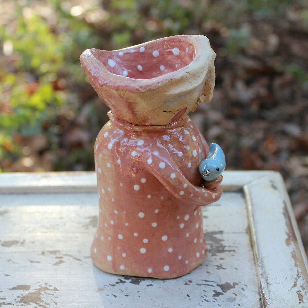 clay Pink and white spot candlestick with bird pottery