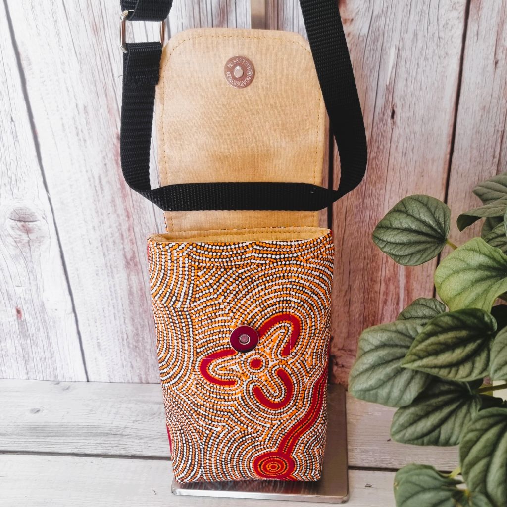 Upcycled small phone messenger bag - Indigenous print - orange & brick red