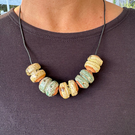 Handmade Clay bead necklace | Unique Earthy Tones on Black Leather Cord