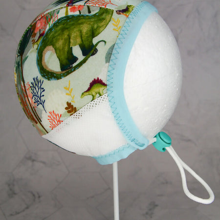 Hearing Aid Bonnet Pilot Cap - Dinosaurs