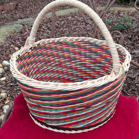 Large Round Market Basket orang, green, black, red, and natural.