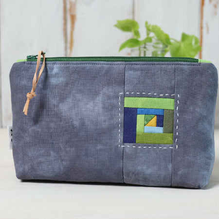 Hand dyed zipper pouch, with patchwork panels.