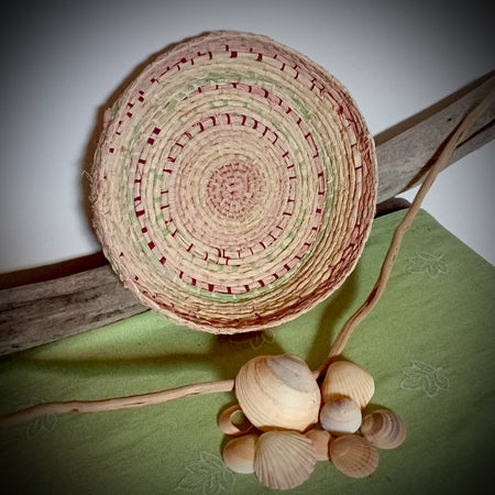 Woven tray basket with soft green and pink