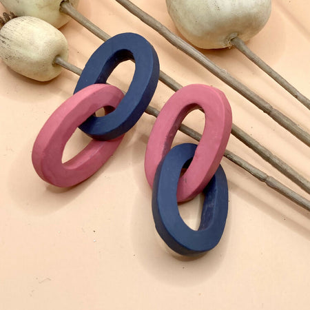 Links pink and blue dangle stud earrings