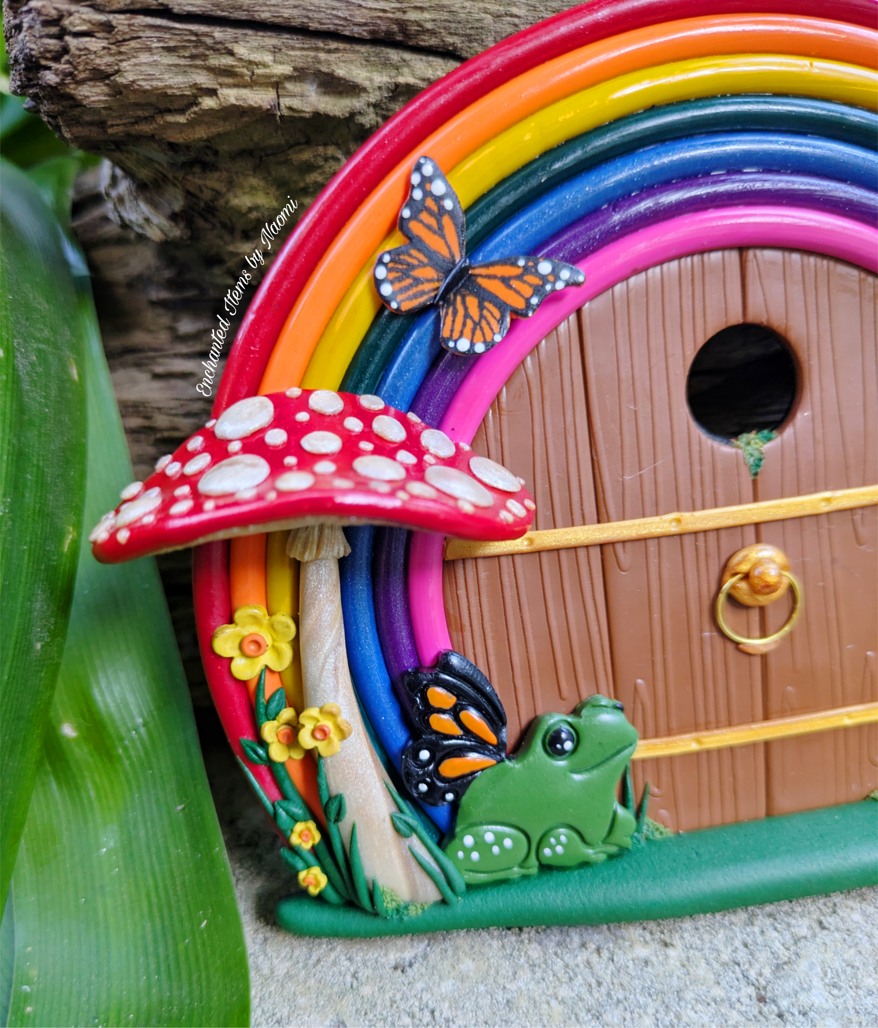 Hand-Sculpted Rainbow Fairy Door with Butterfly-Winged Frog