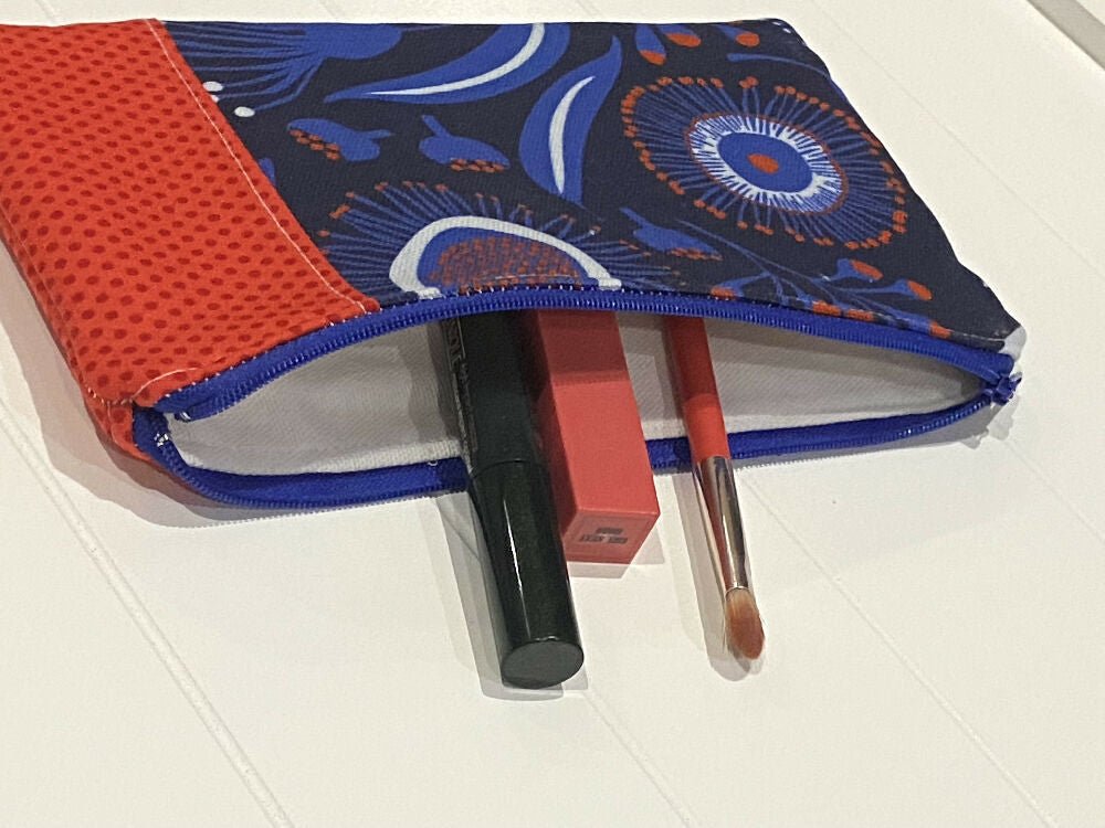Red and blue gum blossom purse