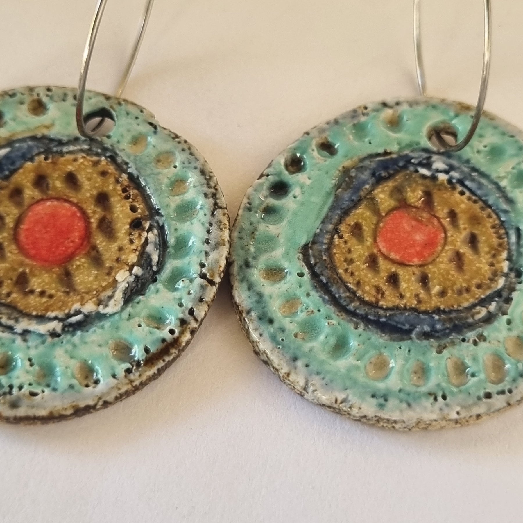 Handmade Stoneware Ceramic Earrings, turquoise-blue-mustard-coral multi-coloured, 35mm diameter, pierced ears