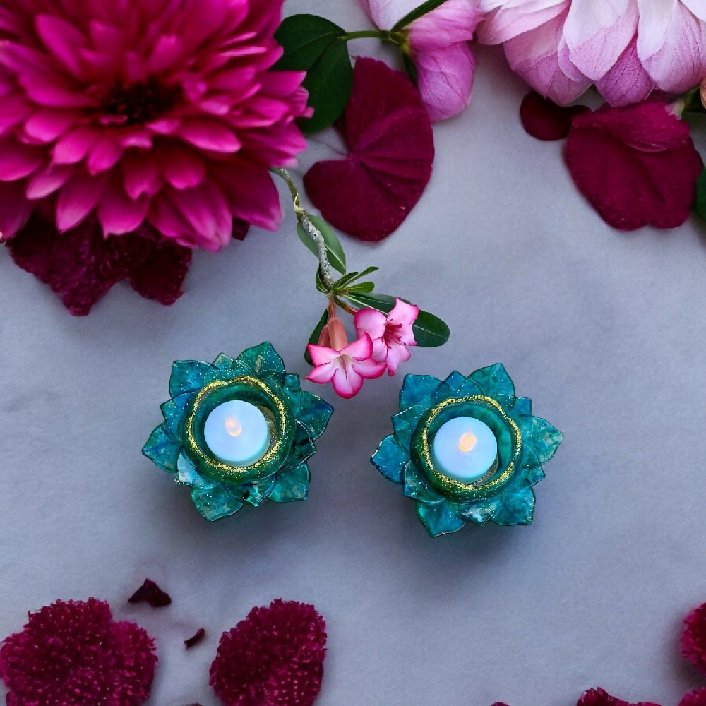 Aqua and gold lotus flower tea lights