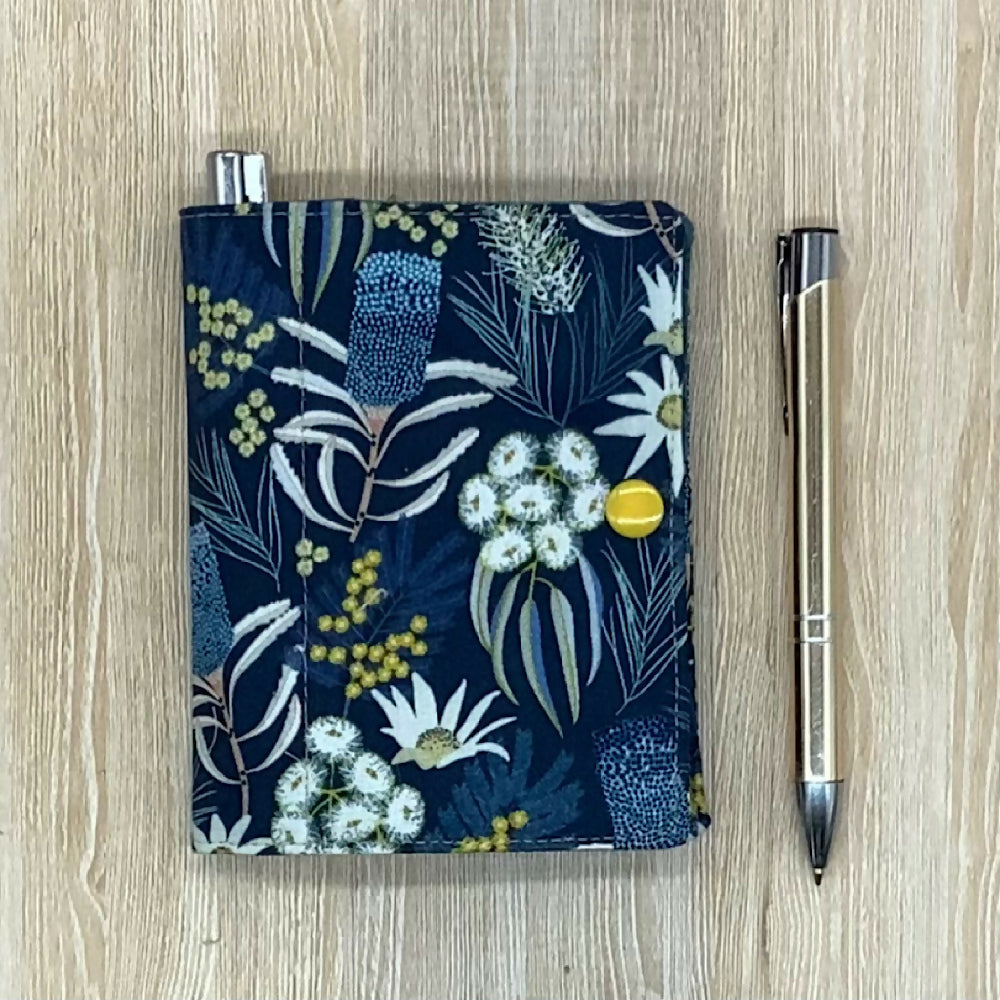 Australian Wildflowers refillable fabric pocket notepad cover with snap closure. Incl. book and pen.