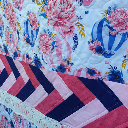 Bespoke baby quilt with Hot air balloons and vintage lace