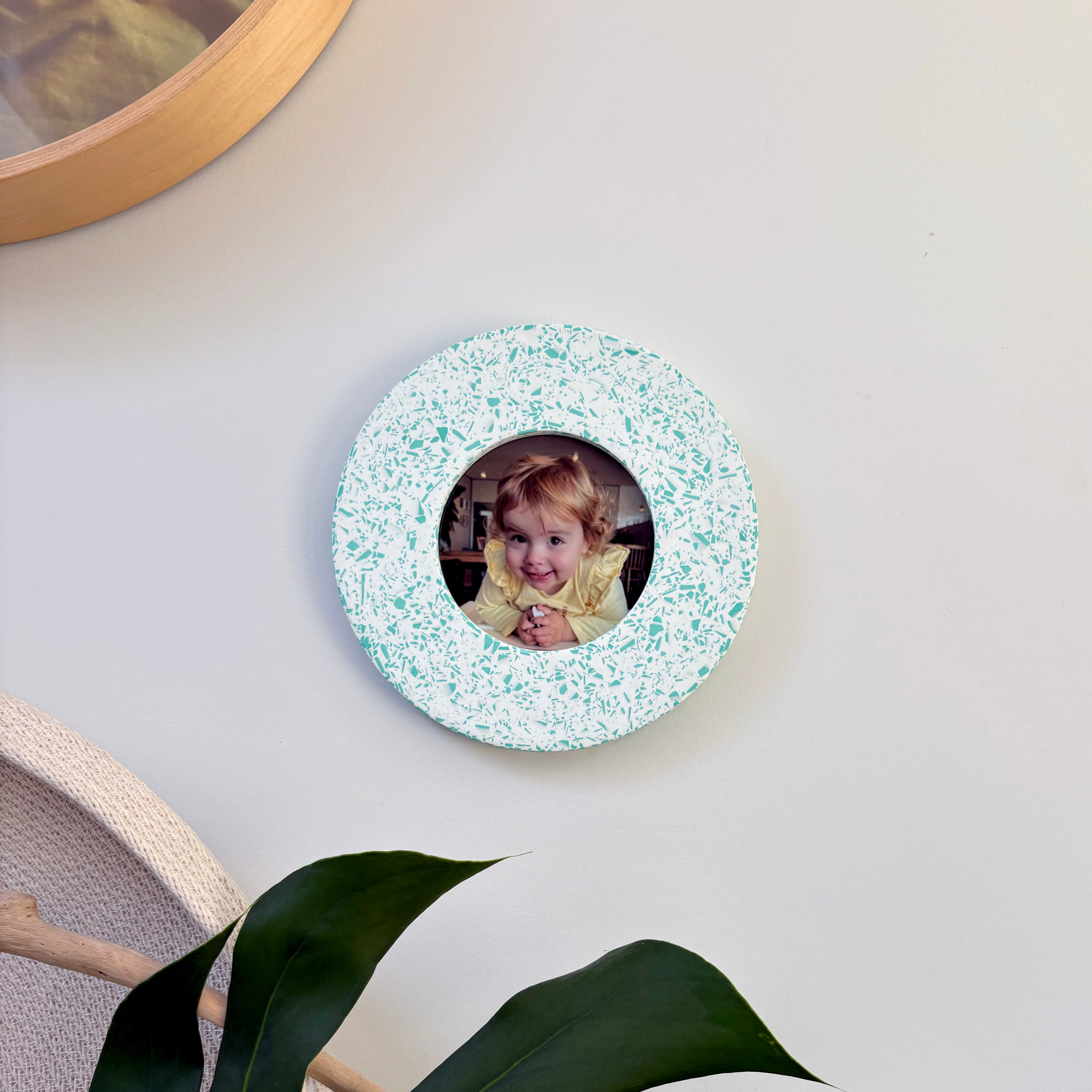 Bright teal green and white terrazzo pattern wall hanging picture frame