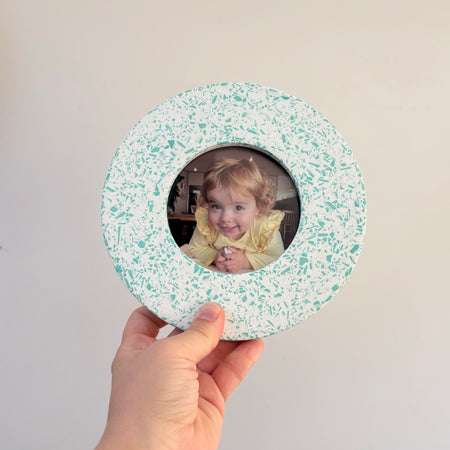 Bright teal green and white terrazzo pattern wall hanging picture frame