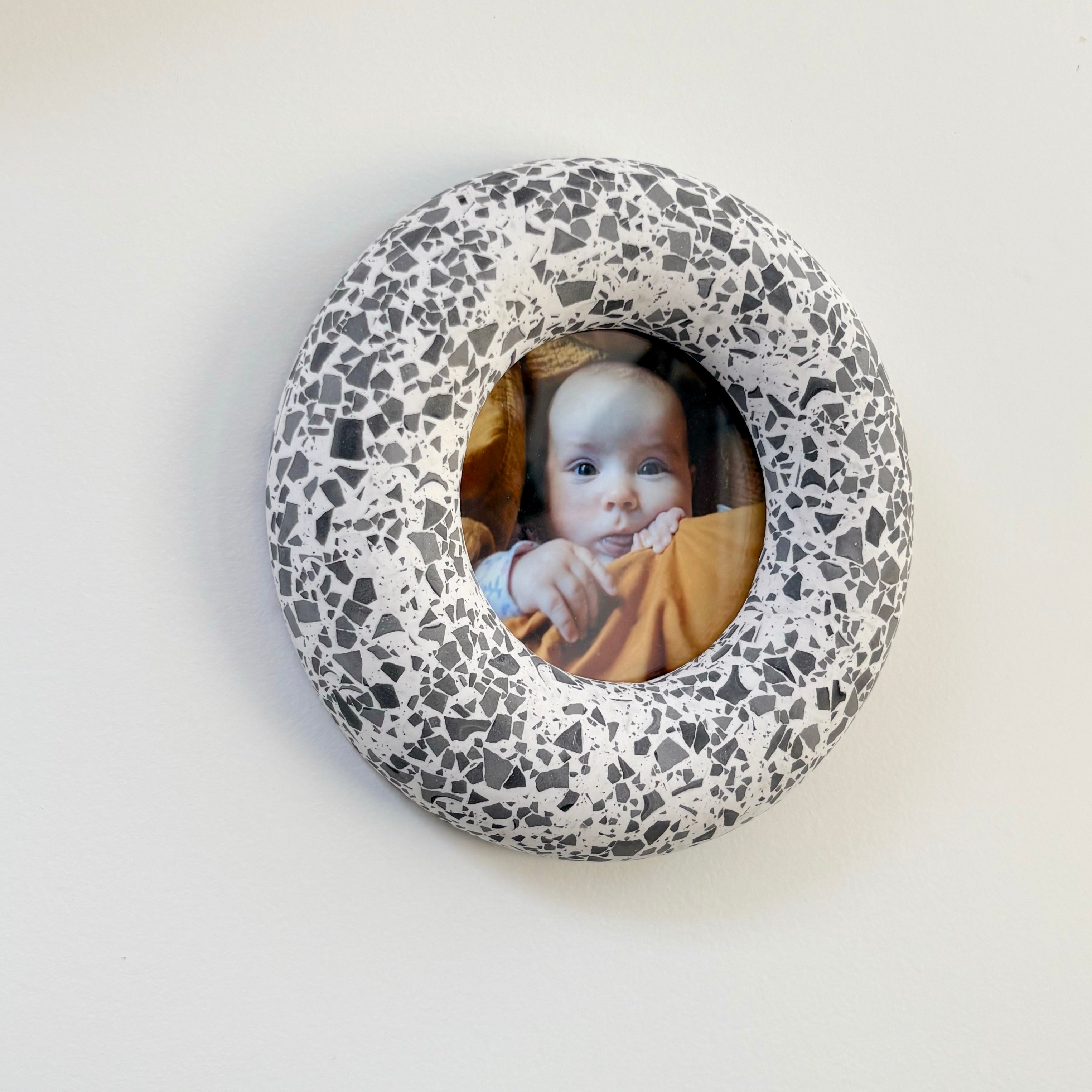 Photo frame, wall hanging Black and white terrazzo pattern