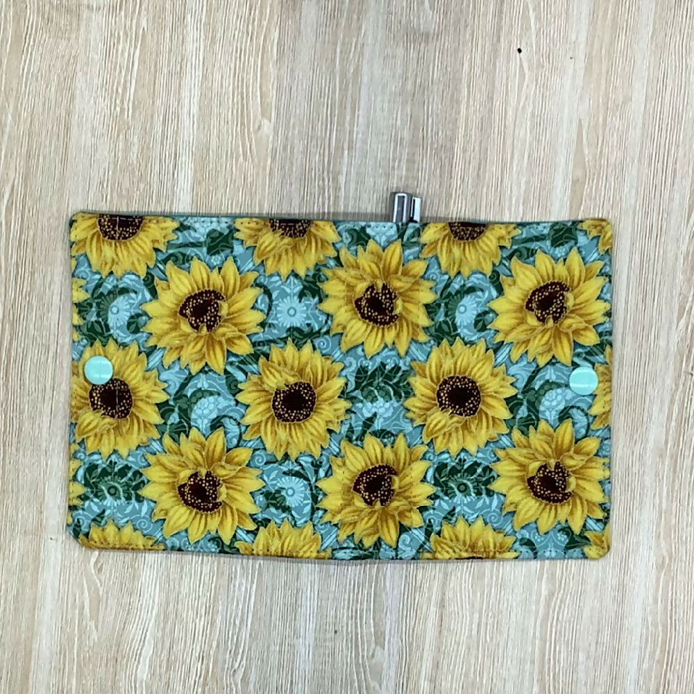 Sunflowers refillable fabric pocket notepad cover with snap closure. Incl. book and pen.