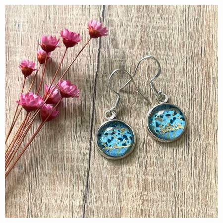 Blue and gold patterned earrings in dangles or studs