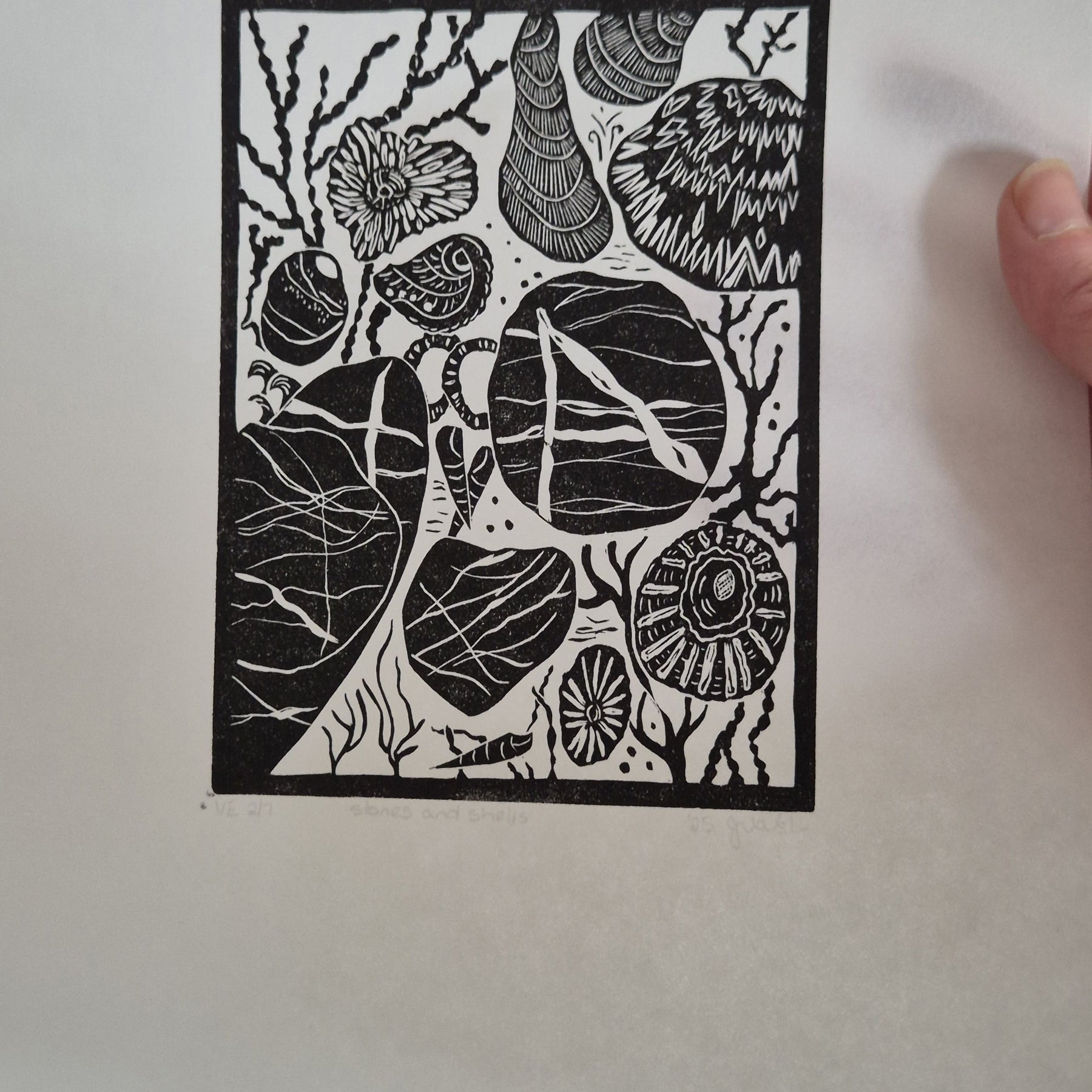 Original linocut art titled Shells and Stones