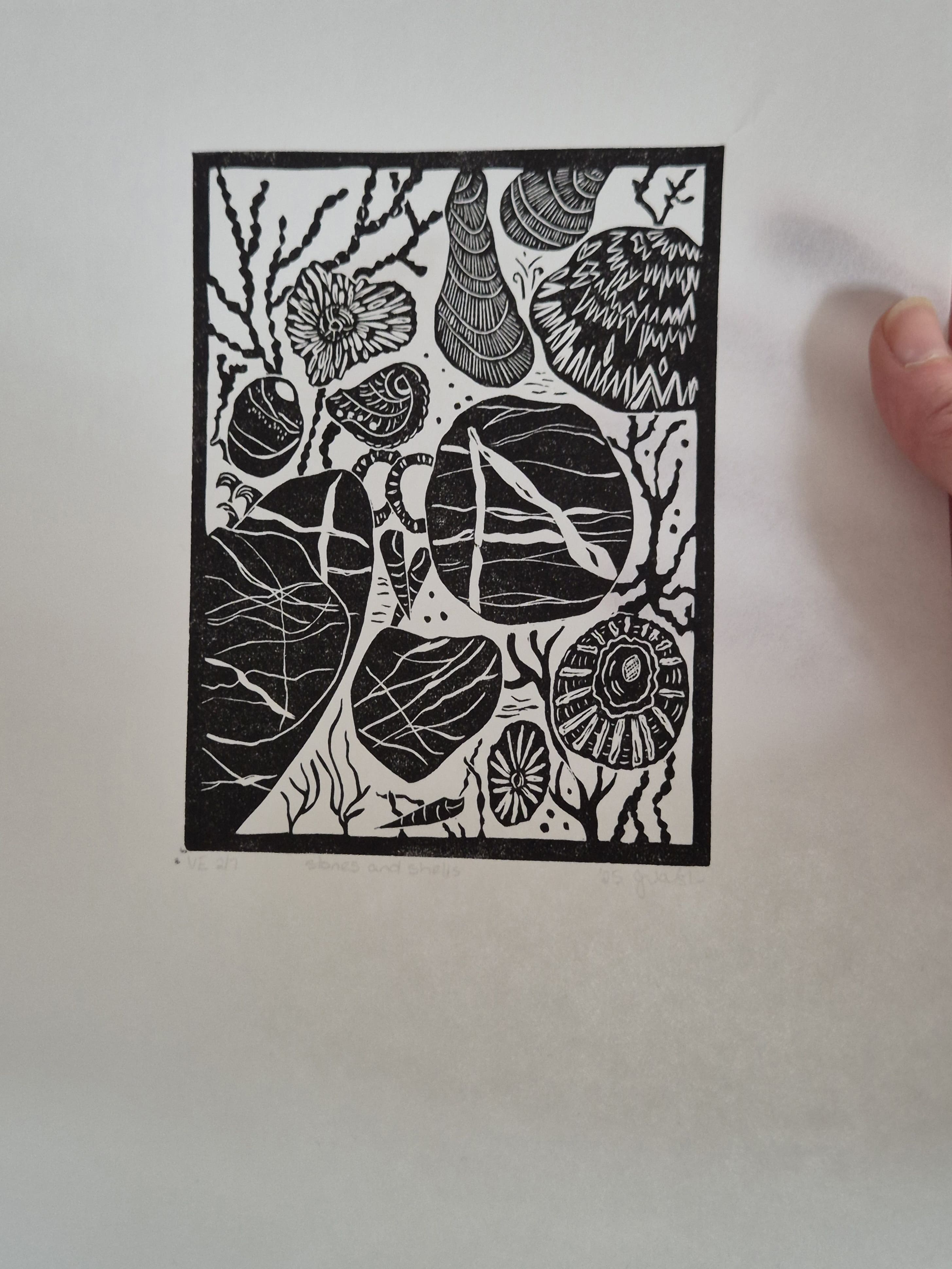 Original linocut art titled Shells and Stones