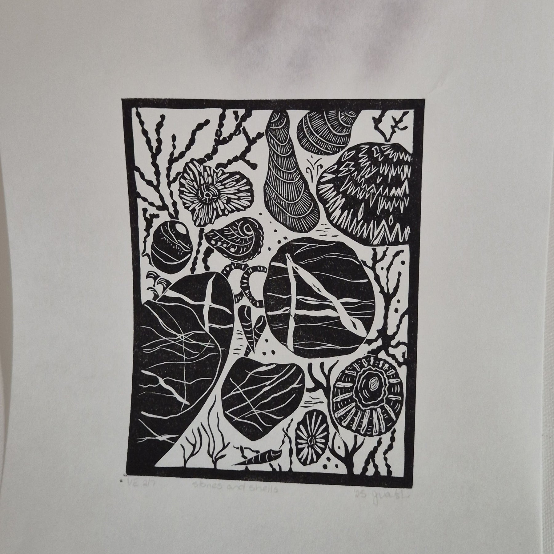 Original linocut art titled Shells and Stones
