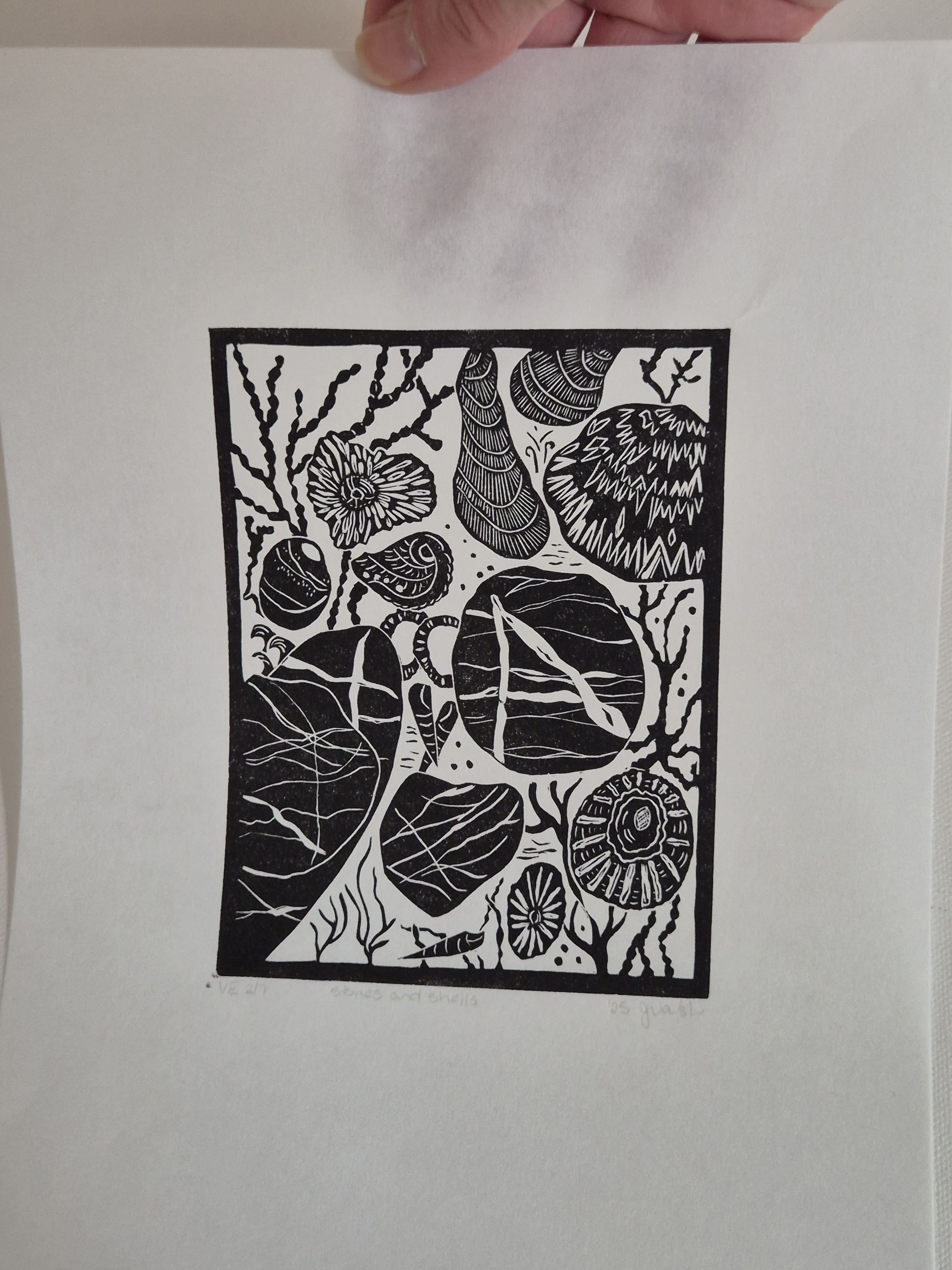 Original linocut art titled Shells and Stones