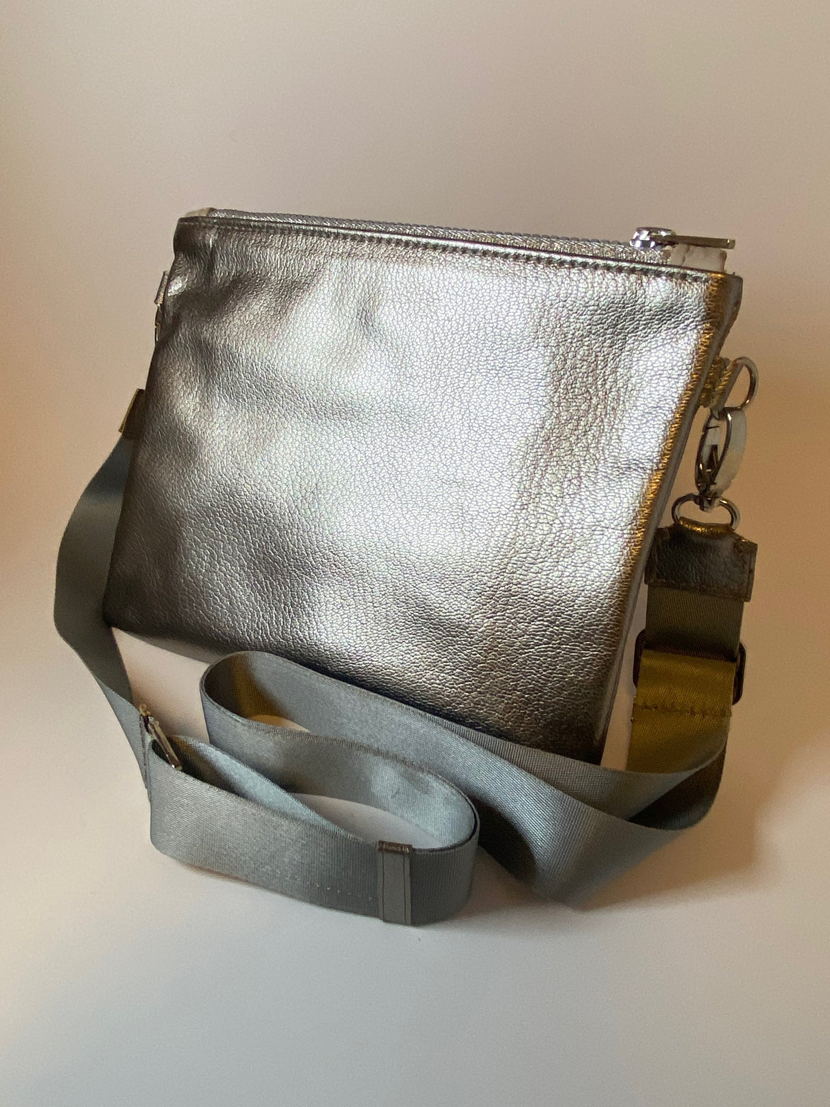 Metallic silver zip top crossbody bag