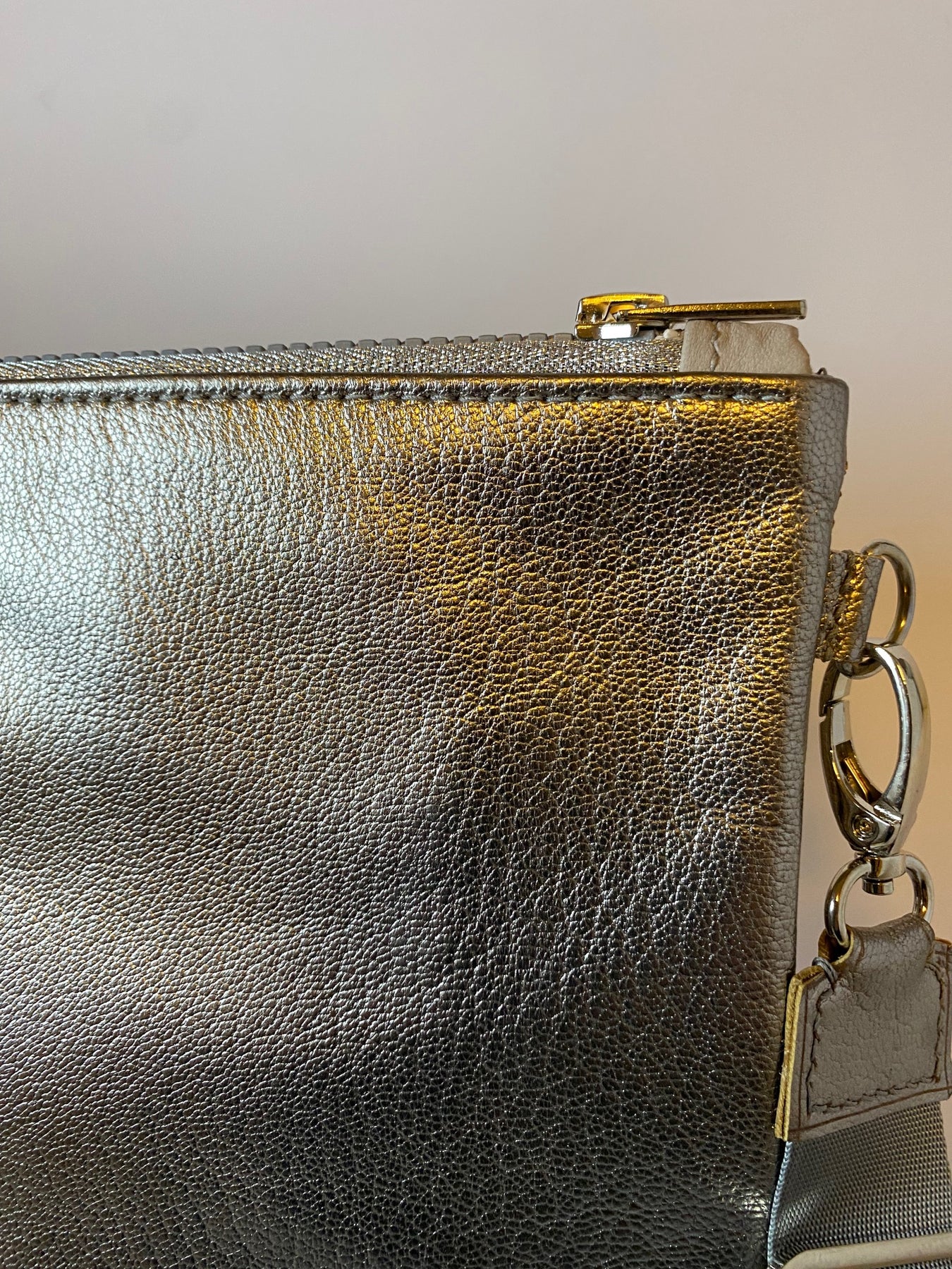 Metallic silver zip top crossbody bag