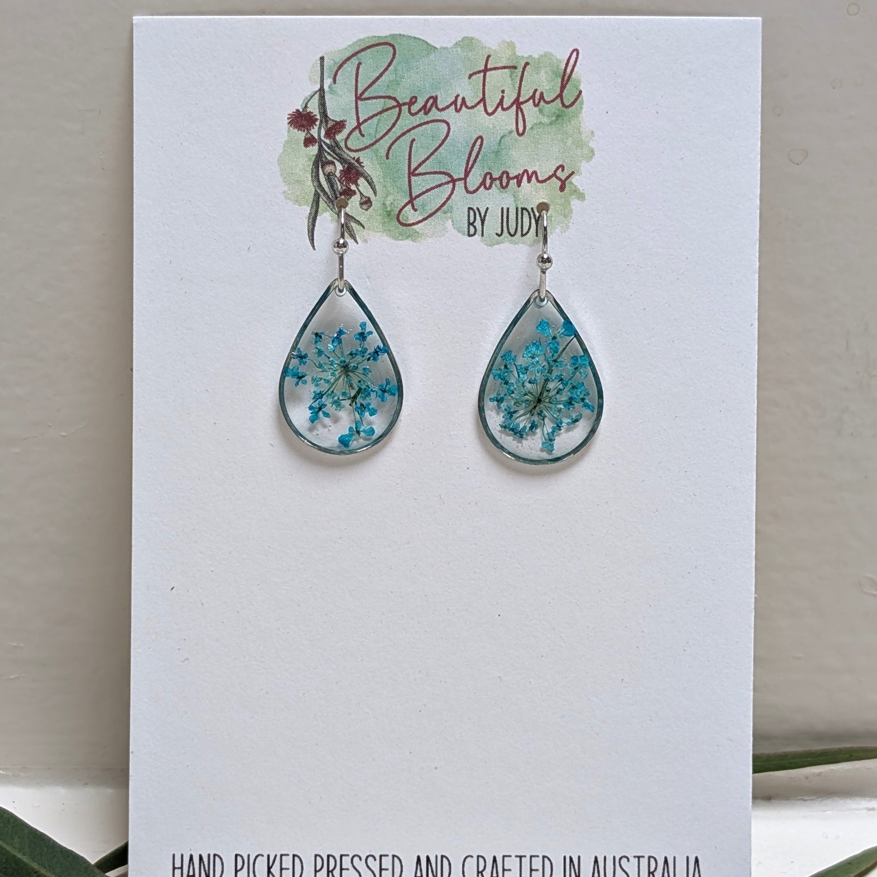 Teardrop silver earrings with teal Queen Anne's Lace