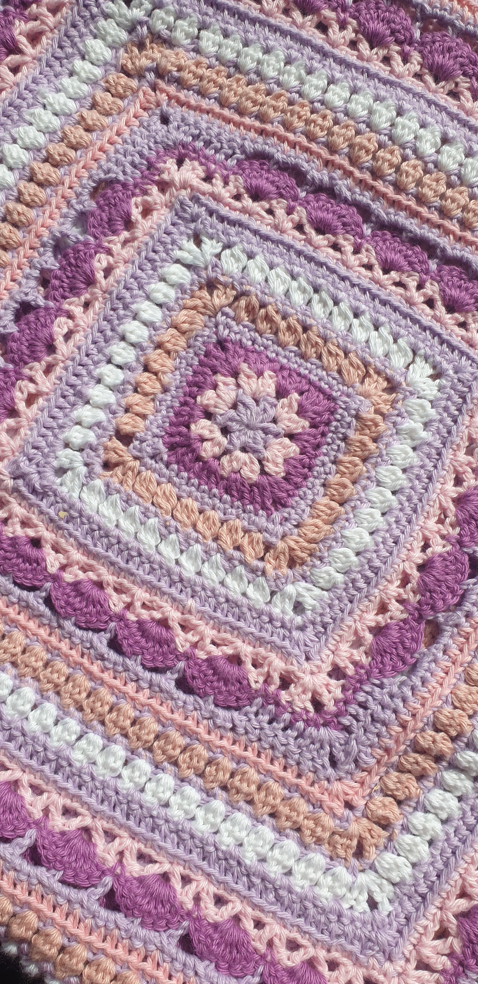 Beautiful crochet cotton afghan in pink/lilacs