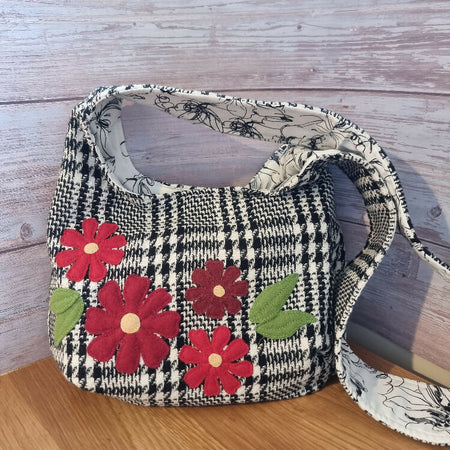 Bright red blooms, houndstooth check upcycled slouchy hobo bag.