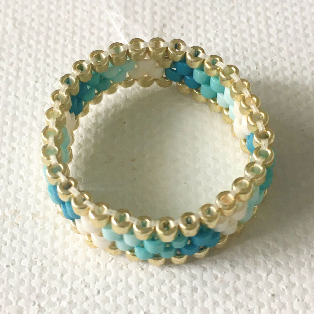 Blue, turquoise, white and gold beaded peyote ring
