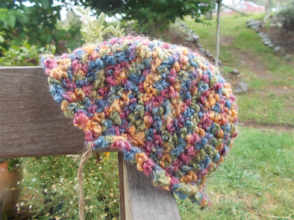 crocheted cloche made from pastel pure wool