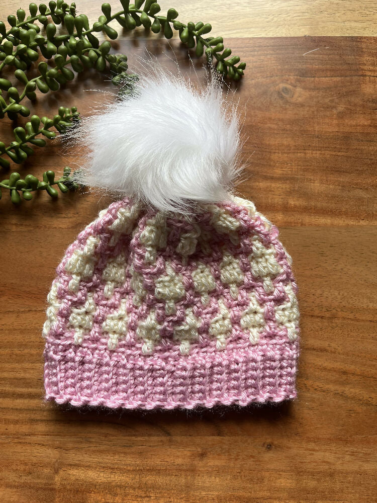 Pink and white children’s beanie