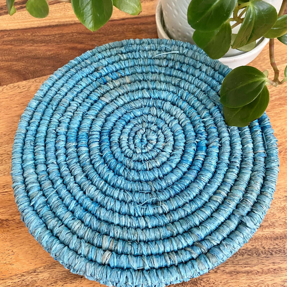 Handcrafted bright blue raffia bowl