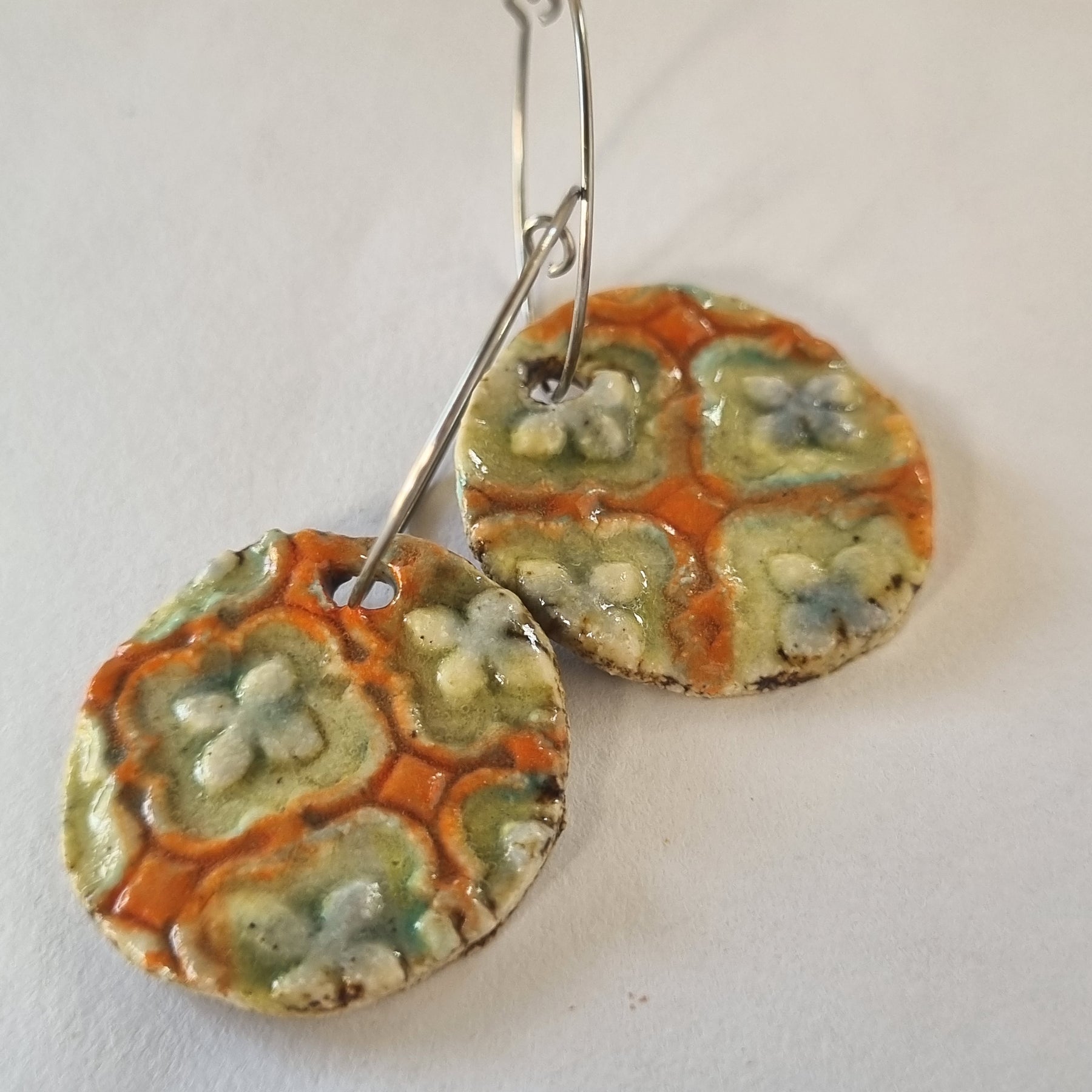 Handmade Stoneware Ceramic Earrings, orange multi-coloured, 28mm diameter, pierced ears