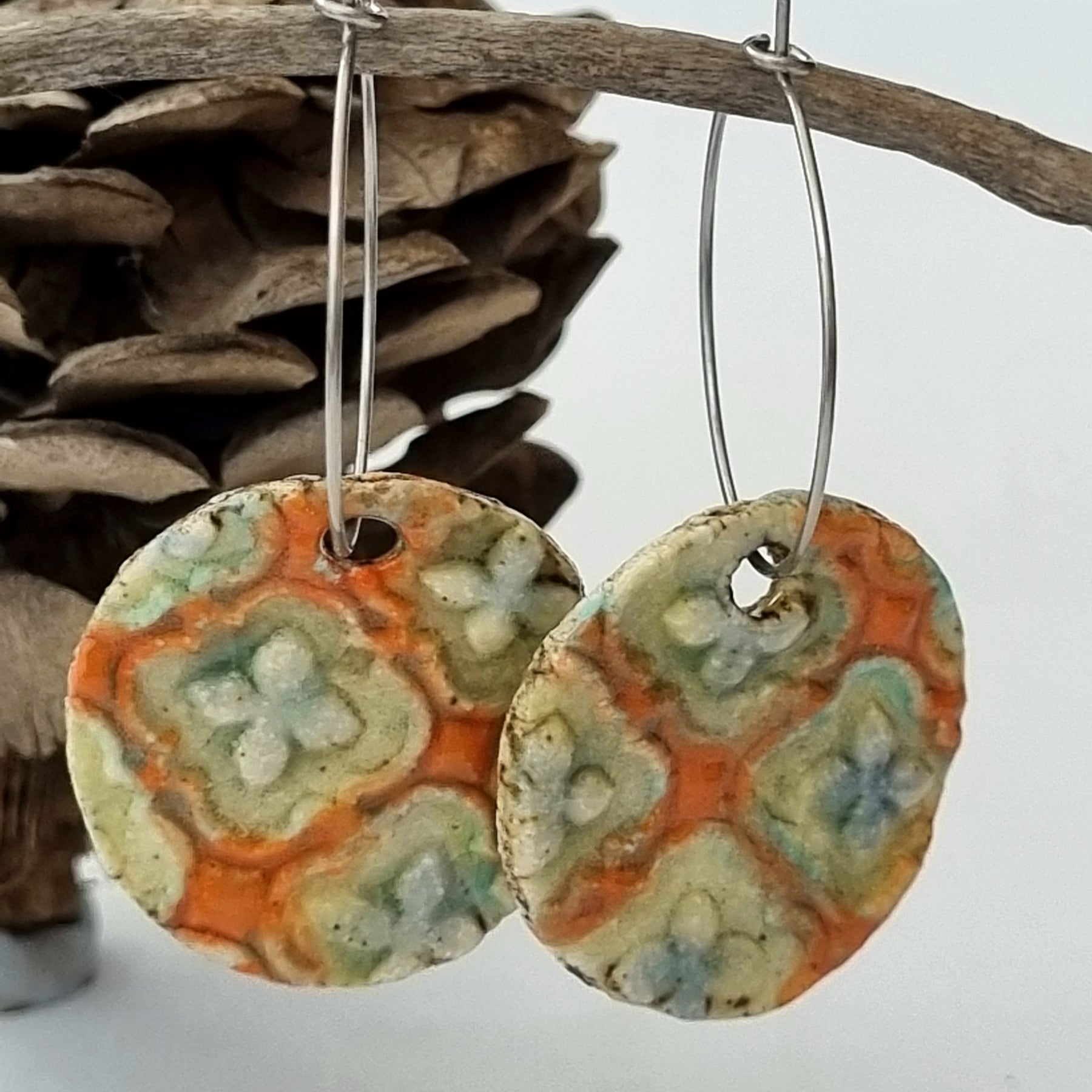 Handmade Stoneware Ceramic Earrings, orange multi-coloured, 28mm diameter, pierced ears