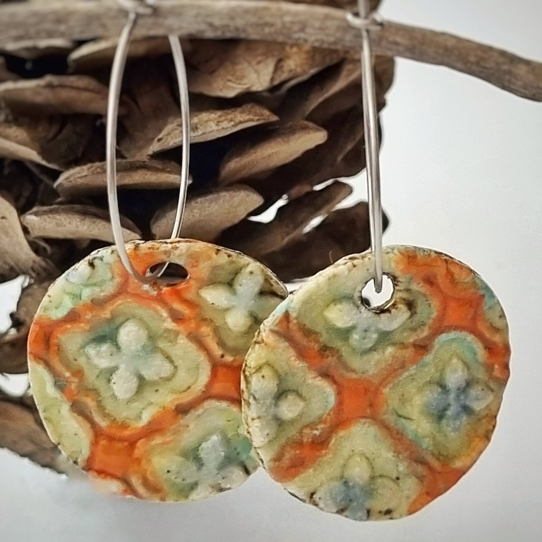 Handmade Stoneware Ceramic Earrings, orange multi-coloured, 28mm diameter, pierced ears