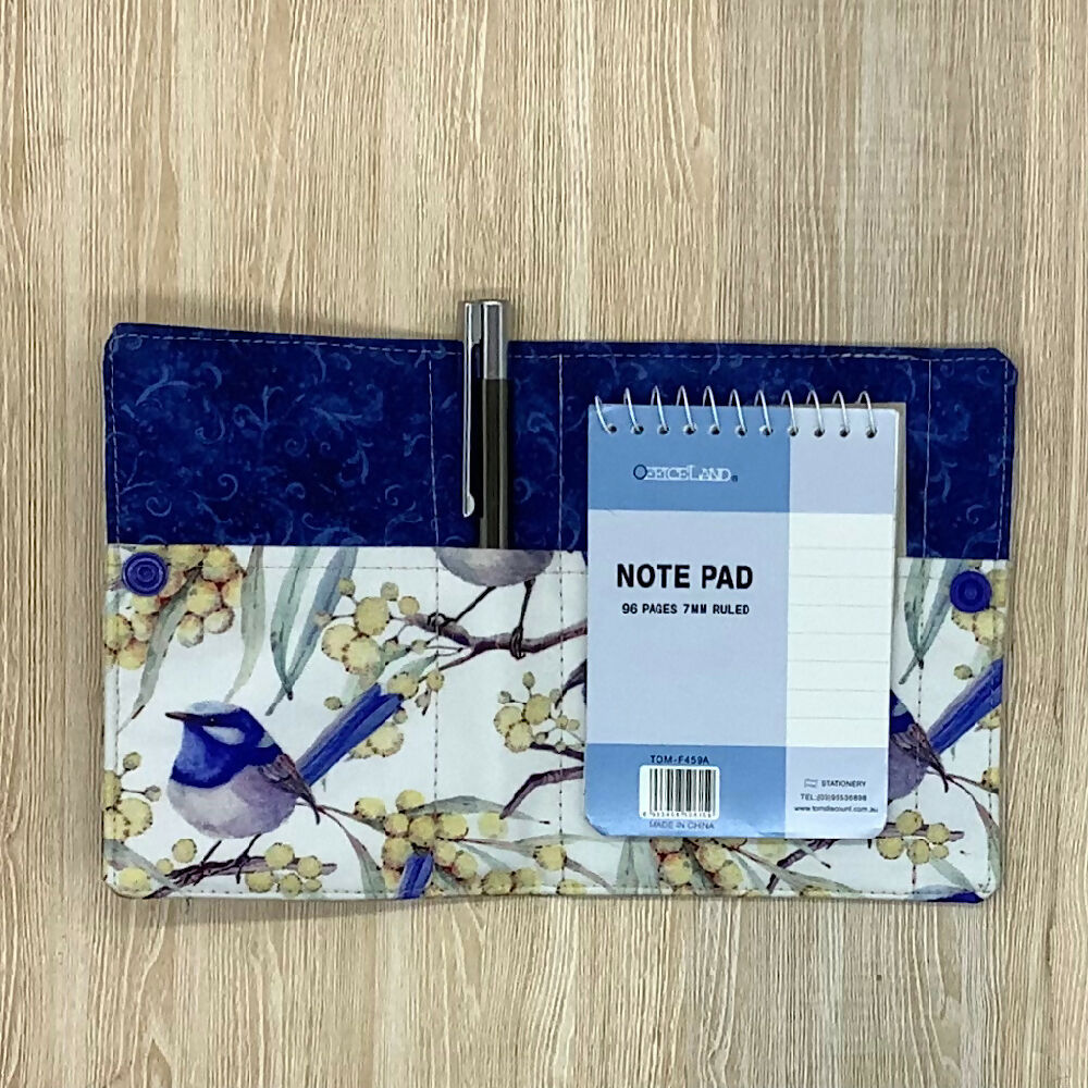 Wrens refillable fabric pocket notepad cover with snap closure. Incl. book and pen.