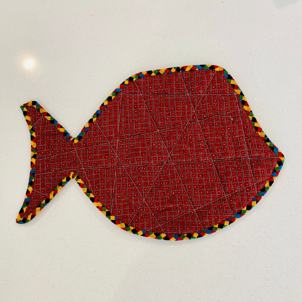 Fish shaped table mat