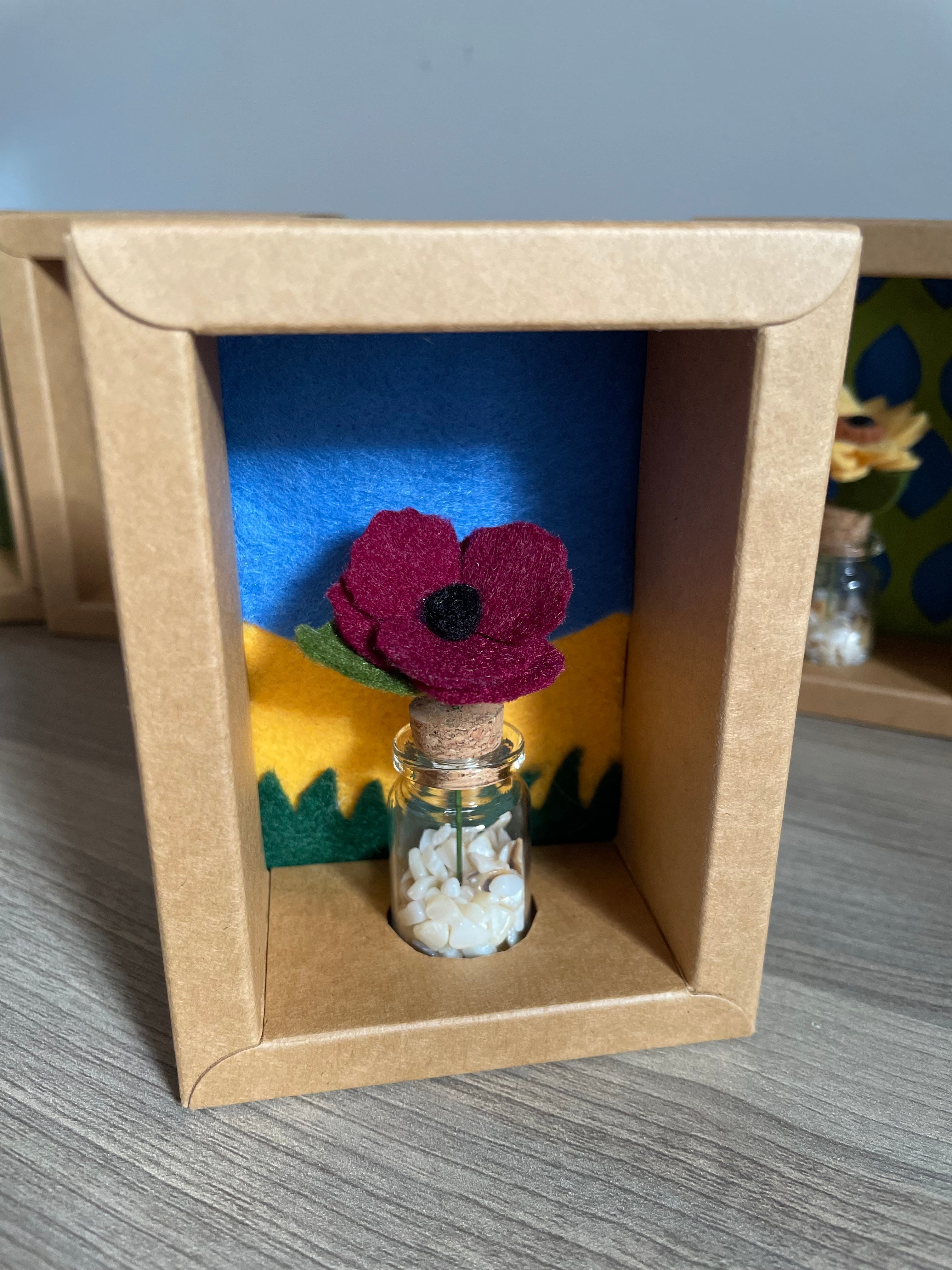 Minature flower in glass jar