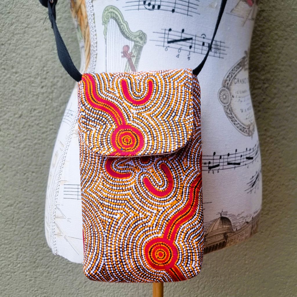 Upcycled small phone messenger bag - Indigenous print - orange & brick red