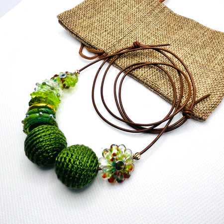 Handmade strand necklace - crochet and glass