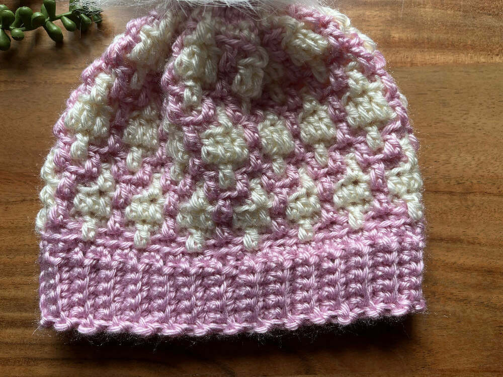 Pink and white children’s beanie