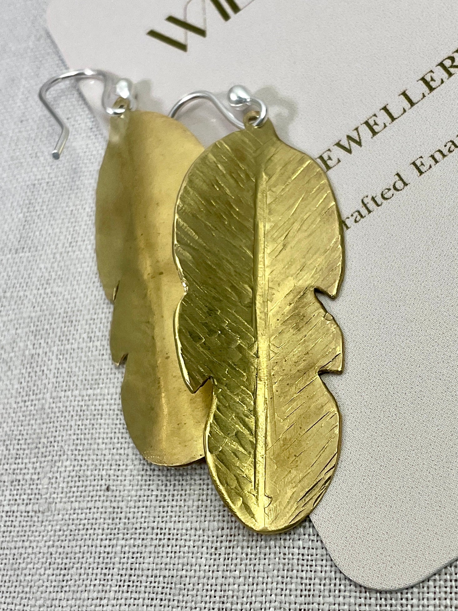 Brass leaf earrings.