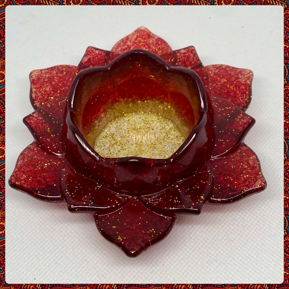 Red and gold sparkling lotus tea lights