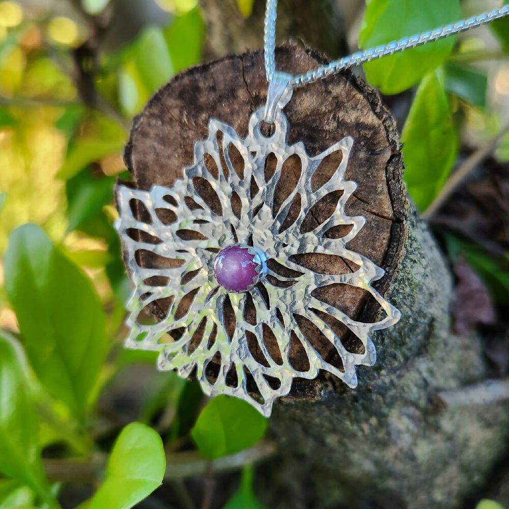 Sterling silver pendant with ruby